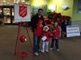 Tim McDonnell and his children rang the bell for the Salvation Army Red Kettle on Saturday, December 19, 2015. Who could say 
